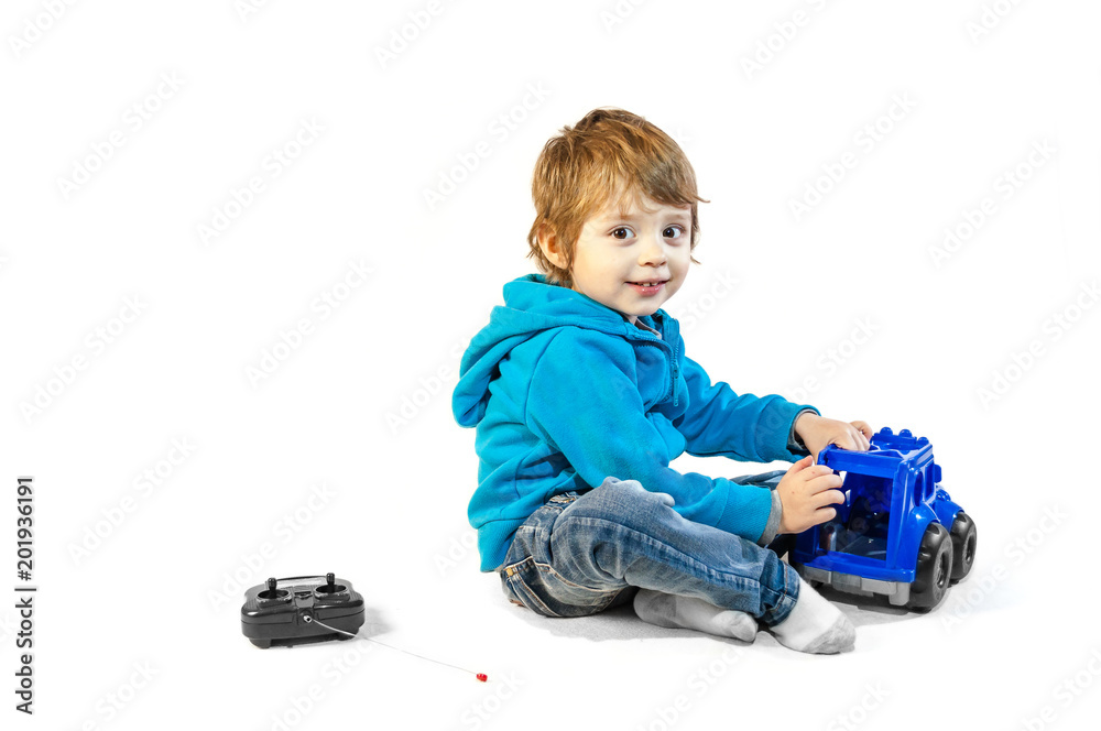 child boy playing with toys isolated on white child boy playing with toys isolated on white