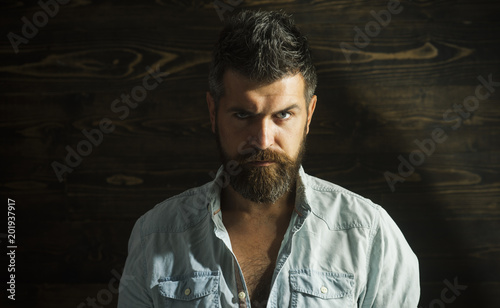 Portrait of bearded hipster with serious face © Volodymyr