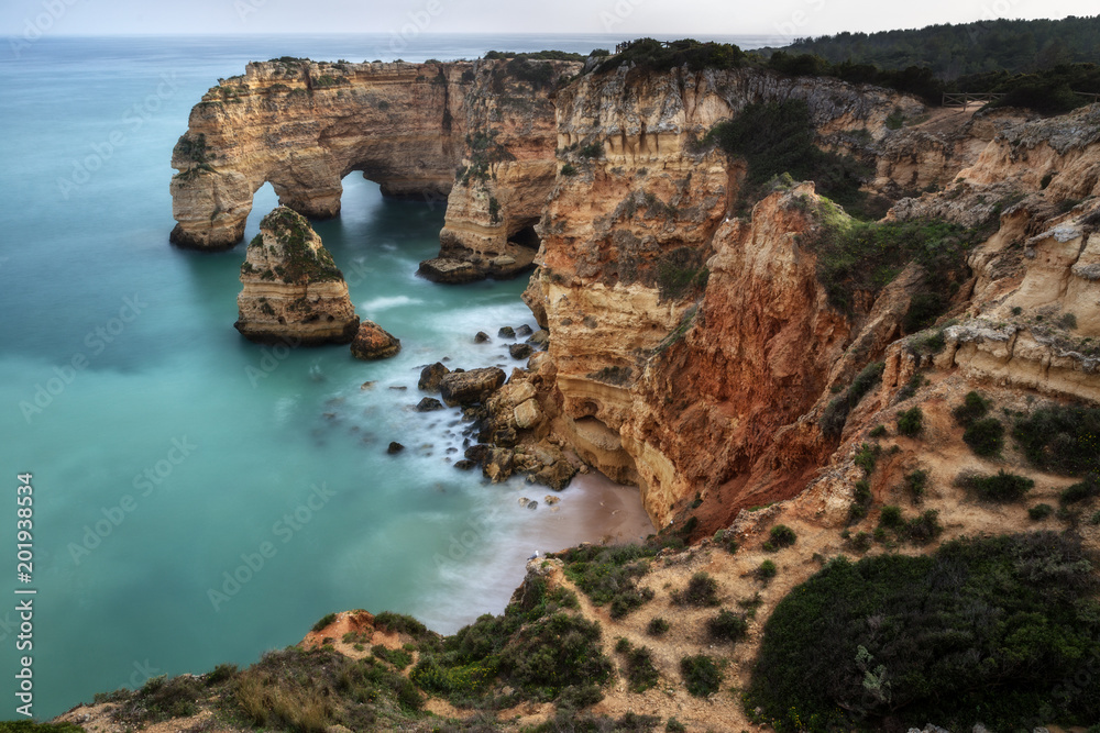 Magnificent seascape of the beach of Marinha before sunset.