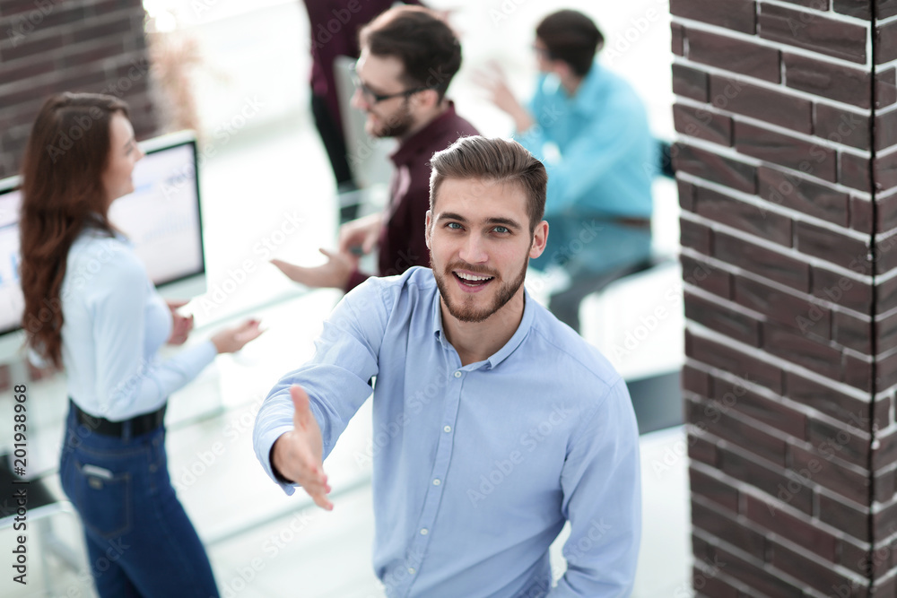 happy young business man portrait in bright modern office indoor happy young business man portrait in bright modern office indoor
