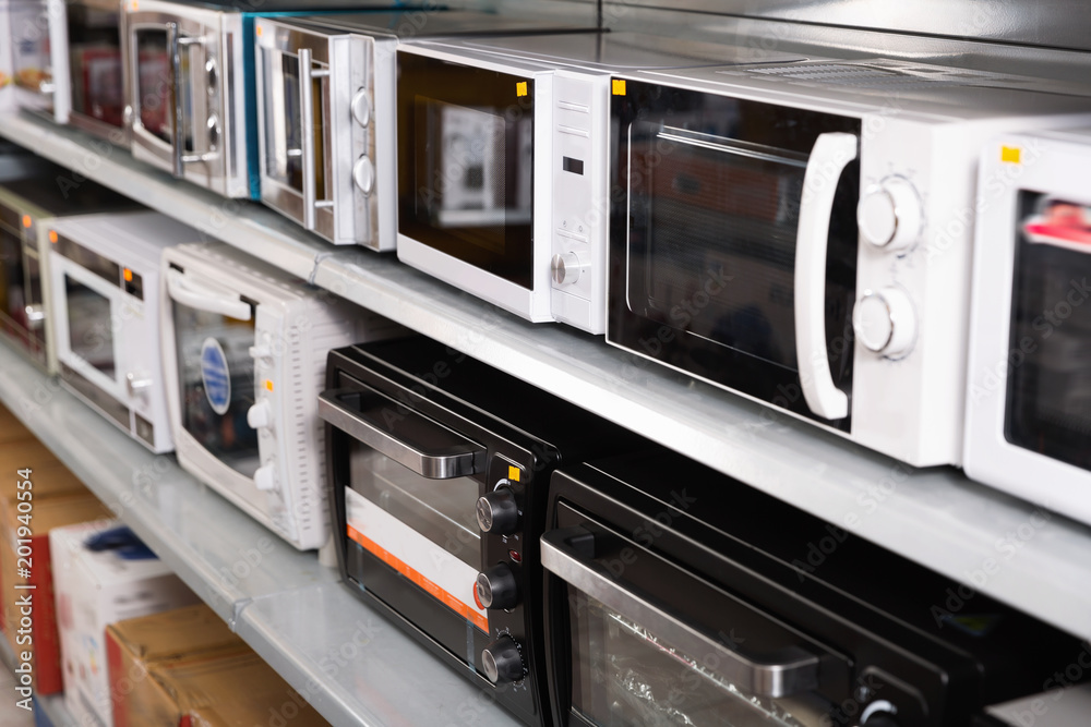 Obraz premium Image of assortment of a kitchen microwave at household appliances store