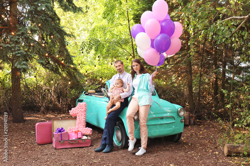 Young family with birthday ...
