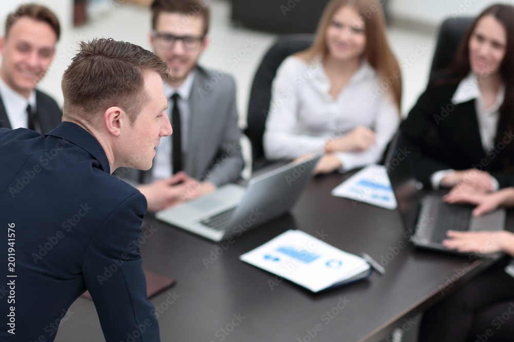 blurred image of business team at a Desk