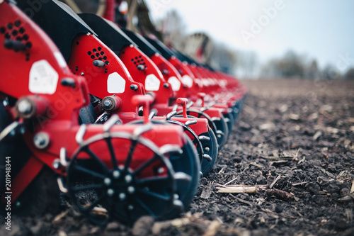 seeders work in the field on the ground in the spring