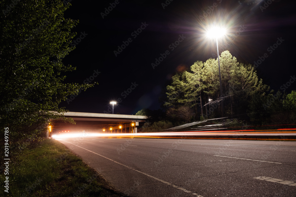 Rural suburban overpass at night