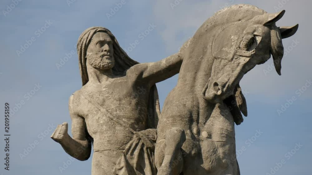 Statue of Arab knight holding a horse Statue of Arab knight holding a horse