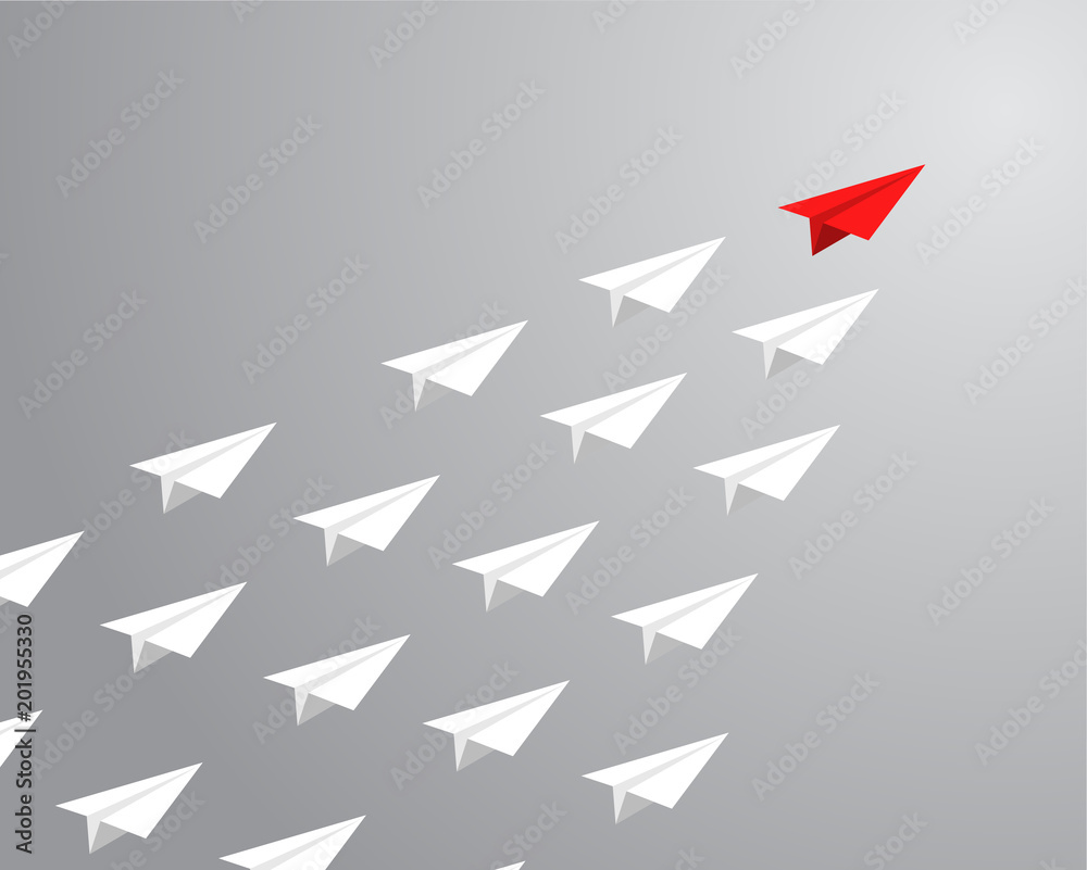 red paper plane leading white ones. leadership concept. red paper plane leading white ones. leadership concept.
