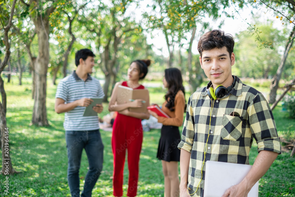 portrait asian young teen student standing in park for studying and education concept portrait asian young teen student standing in park for studying and education concept