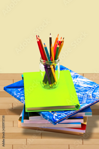 Books ,pen,penci and office equipment on wood table, education and back to school concept,Clipping path photo