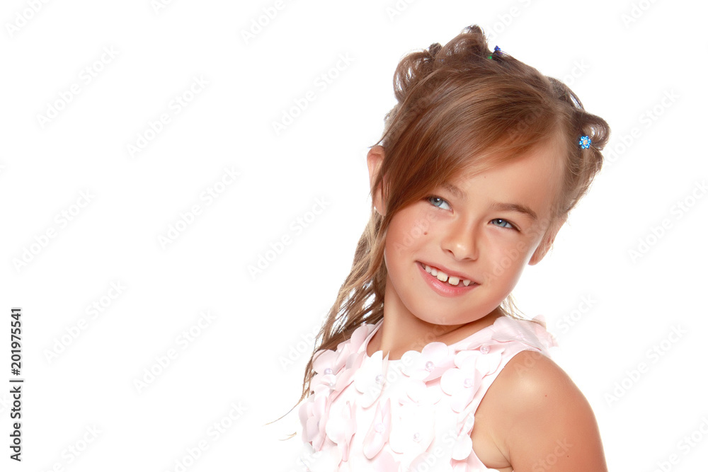 Fashionable little girl in a dress