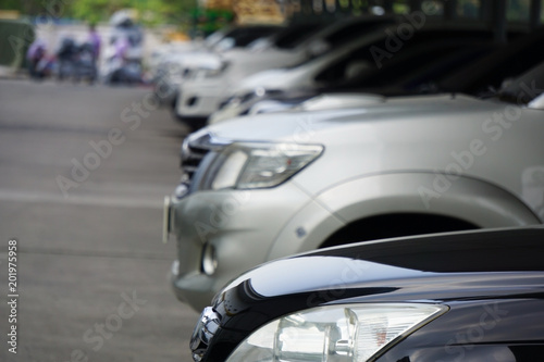 Many brands and many color of cars parking at the garage.Protection from sunshine and rainy.