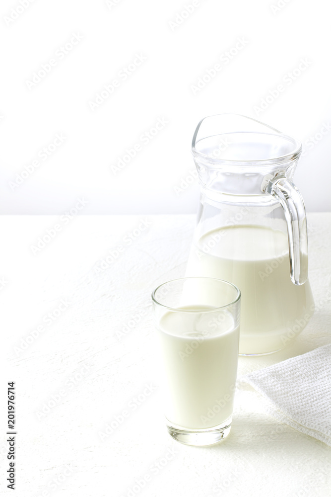 Milk in a jug and a glass