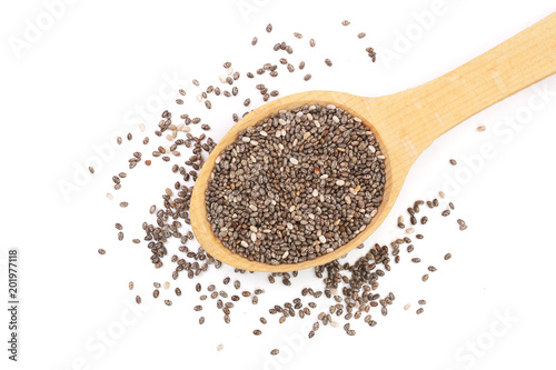 Chia seeds in wooden spoon isolated on white background. Top view