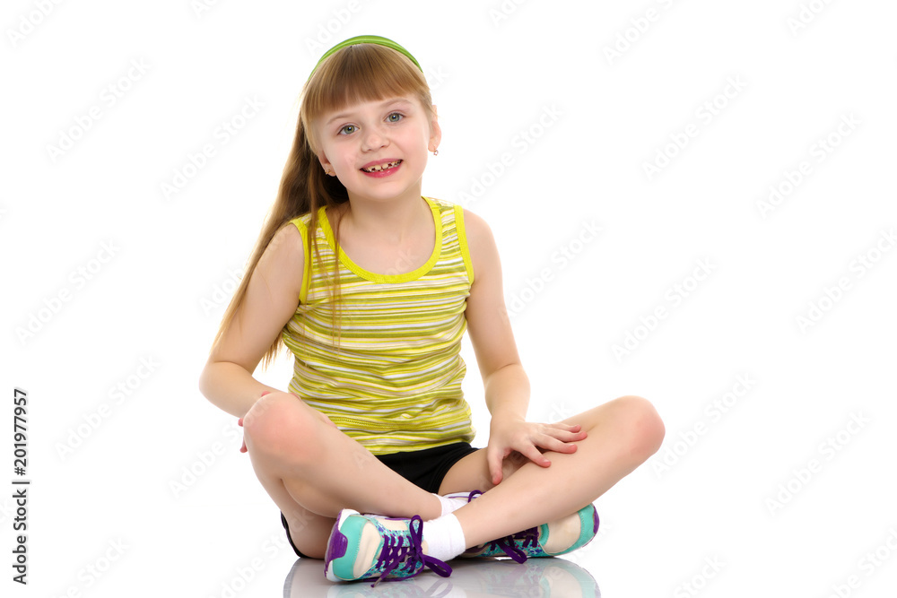 The gymnast perform an acrobatic element on the floor. The gymnast perform an acrobatic element on the floor.