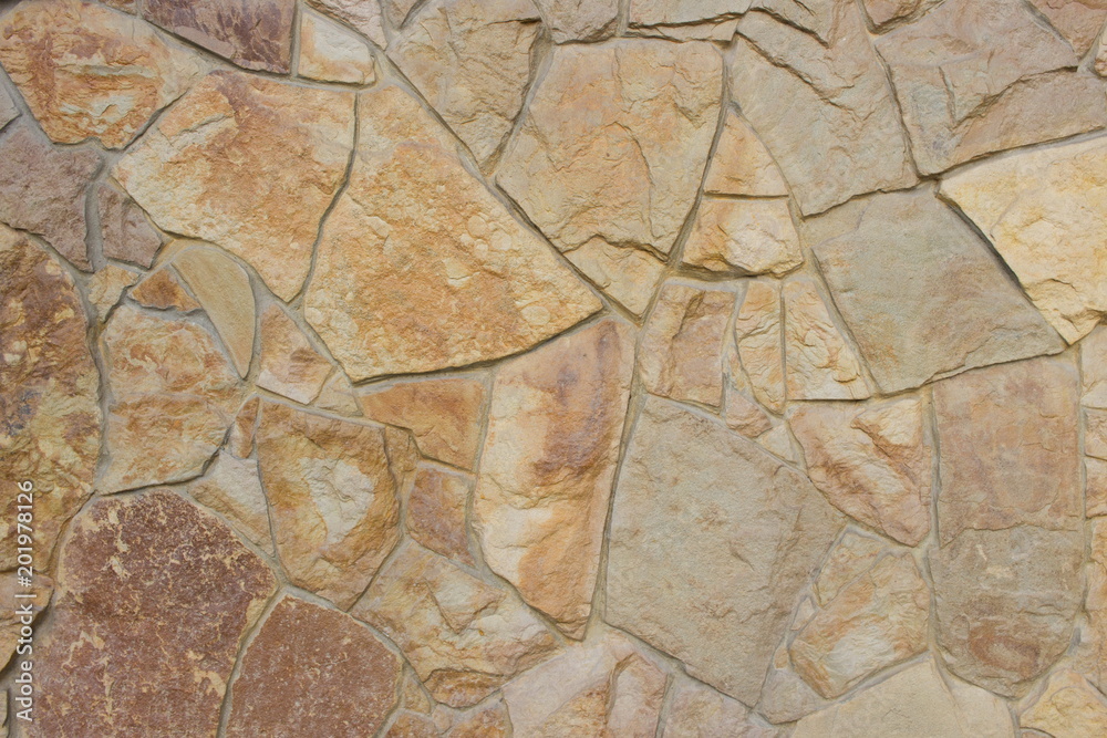 Stones wall background texture. Surface natural color
