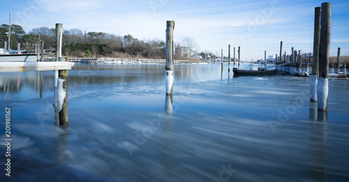 Montauk, USA - circa January 2018: icy watter at a little port on Long Island