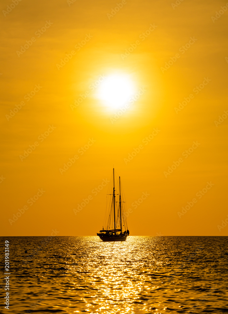 silhouette boat in sea and ocean with beautiful sunset sky