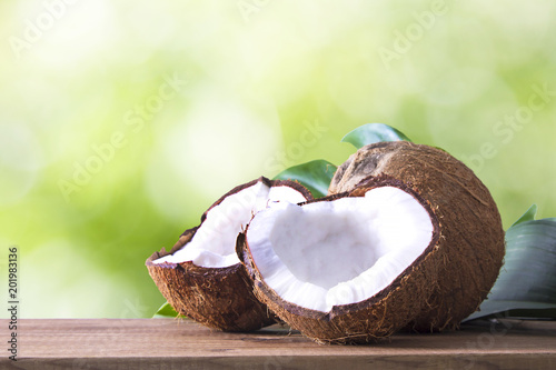 coconut open to natural on wooden bottom