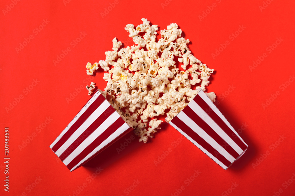 popcorn on color background
