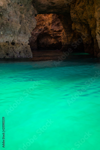 Lagos Caves and Seashore with its Esmerald Water. Exposure done in a boat tour in the Lagos seashore, Algarve, Portugal