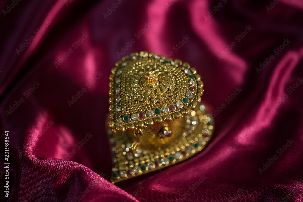 Obraz premium beautiful Indian wedding jewellery in low light 
