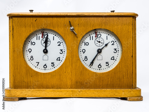 Obraz na płótnie Wooden chess clock on a white background w salonie