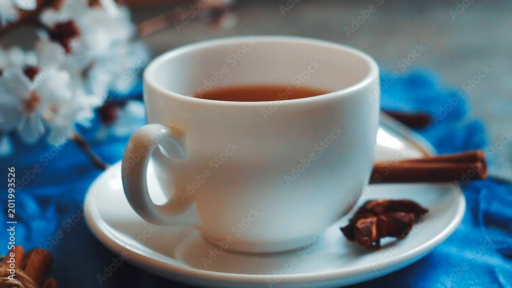 Apricot flowers and tea cup. Spring atmosphere. Apricot flowers and tea cup. Spring atmosphere.