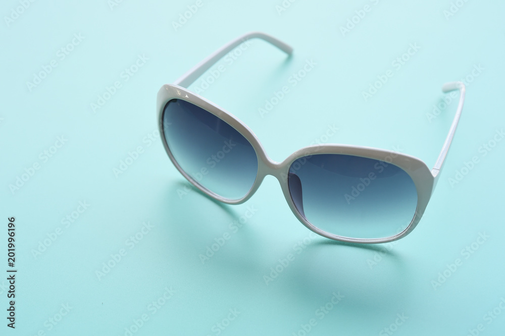 Modern fashionable sunglasses for background Modern fashionable sunglasses for background