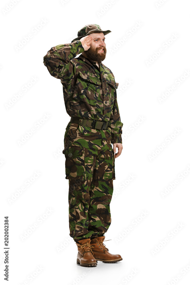 Young army soldier wearing camouflage uniform isolated on white Young army soldier wearing camouflage uniform isolated on white