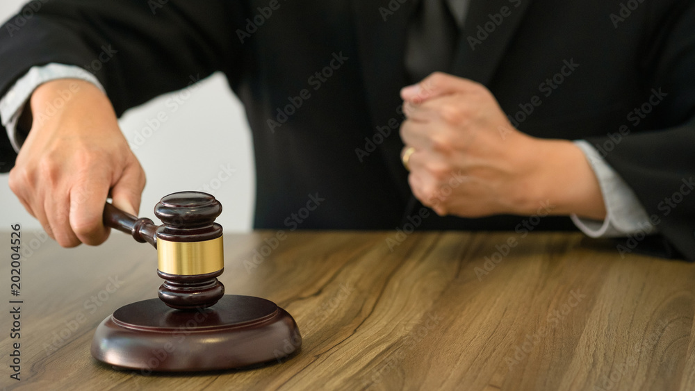justice lawyer / judge gavel in a court room justice lawyer / judge gavel in a court room