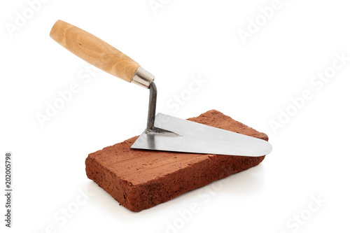 Brick and trowel.