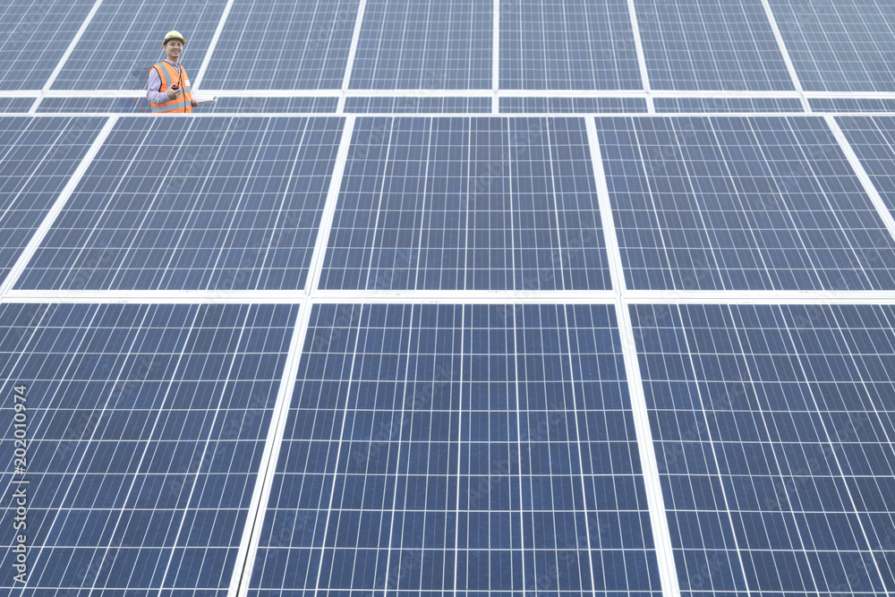 Happy working solar station photovoltaic panels Happy working solar station photovoltaic panels