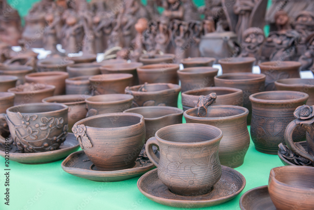 Beautiful pottery mugs of brown color handmade on the market