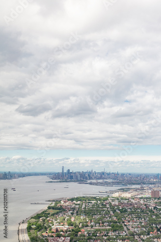 Aerial view toward Manhattan over Brooklyn, Hudson River and Belt Parkway photo