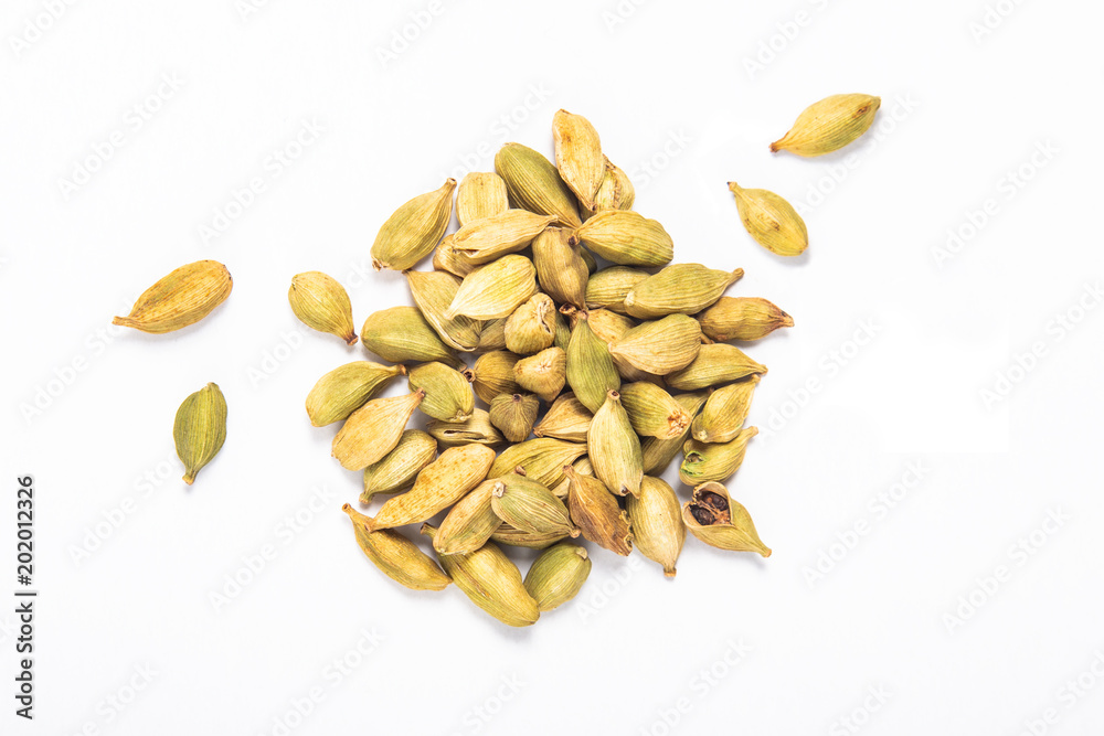 Exotic spices concept organic Cardamom pods on white background
