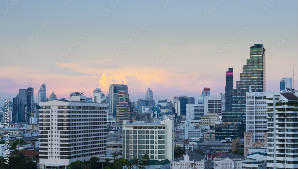Bangkok modern city skyline at dusk.