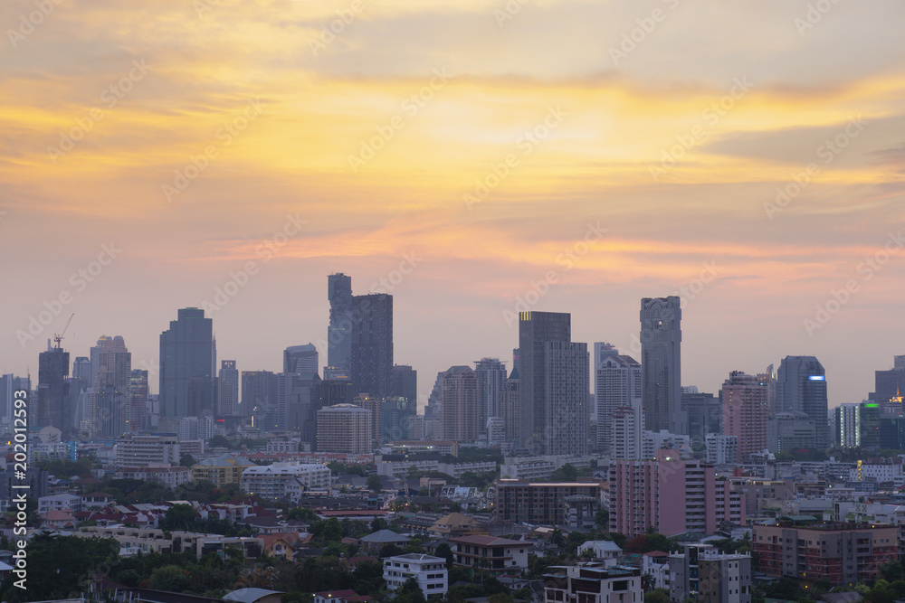 Bangkok modern city skyline at dusk.