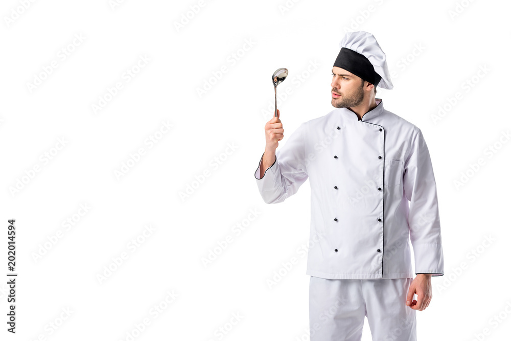 portrait of chef with soup ladle in hand isolated on white