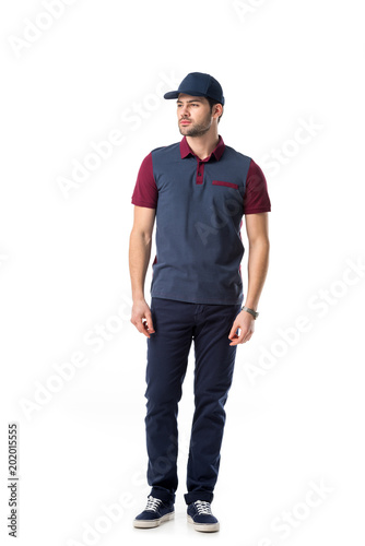 young bearded delivery man in uniform isolated on white