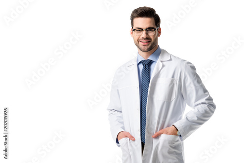 Smiling doctor wearing white coat isolated on white