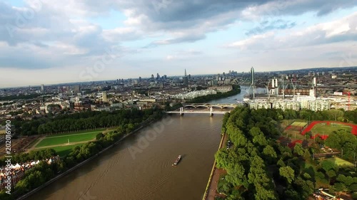 Beautiful Battersea Park and Thames River Aerial Footage around Central London Neighborhood Battersea, Pimlico, Chelsea, Vauxhall feat. London City Skyline on Sunny Day in England United Kingdom HD 4K photo