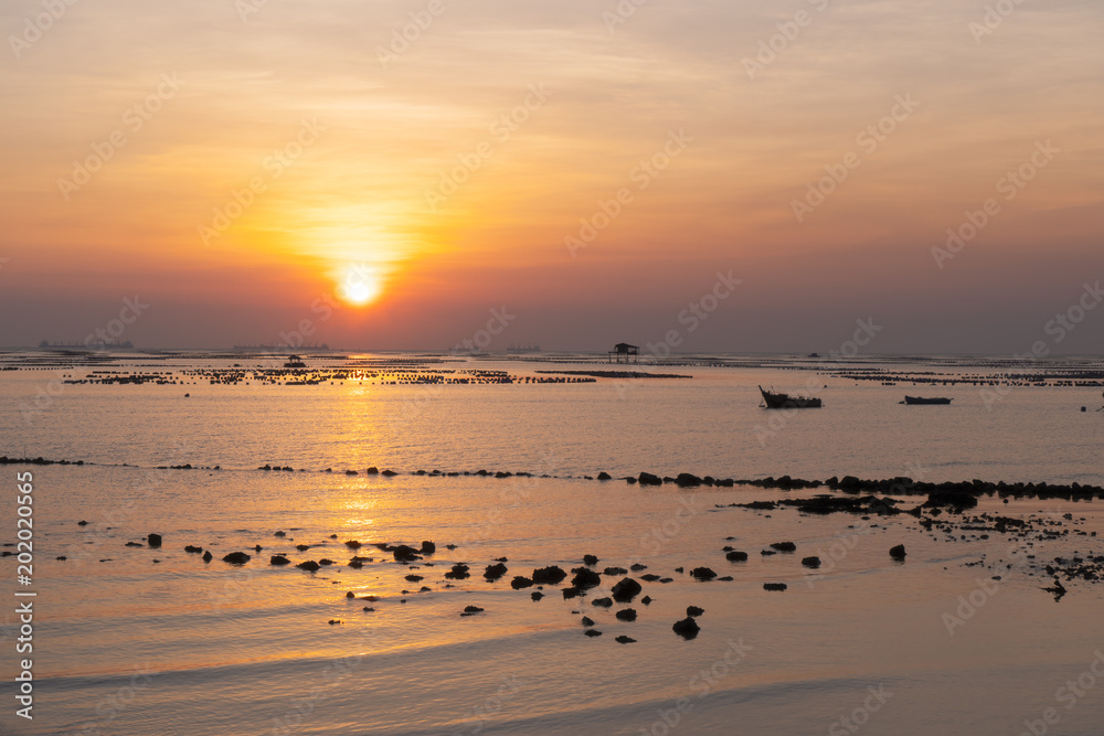 Beautiful Sunset Sunrise Sky over tropical sea landscape, vintage filter.