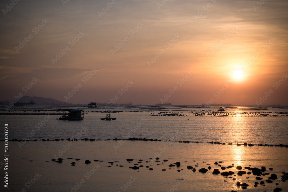 Beautiful Sunset Sunrise Sky over tropical sea landscape, vintage filter.