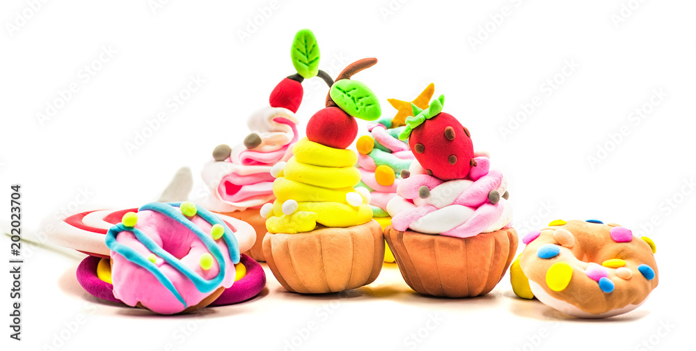 set of bright fake plasticine sweets isolated on white background