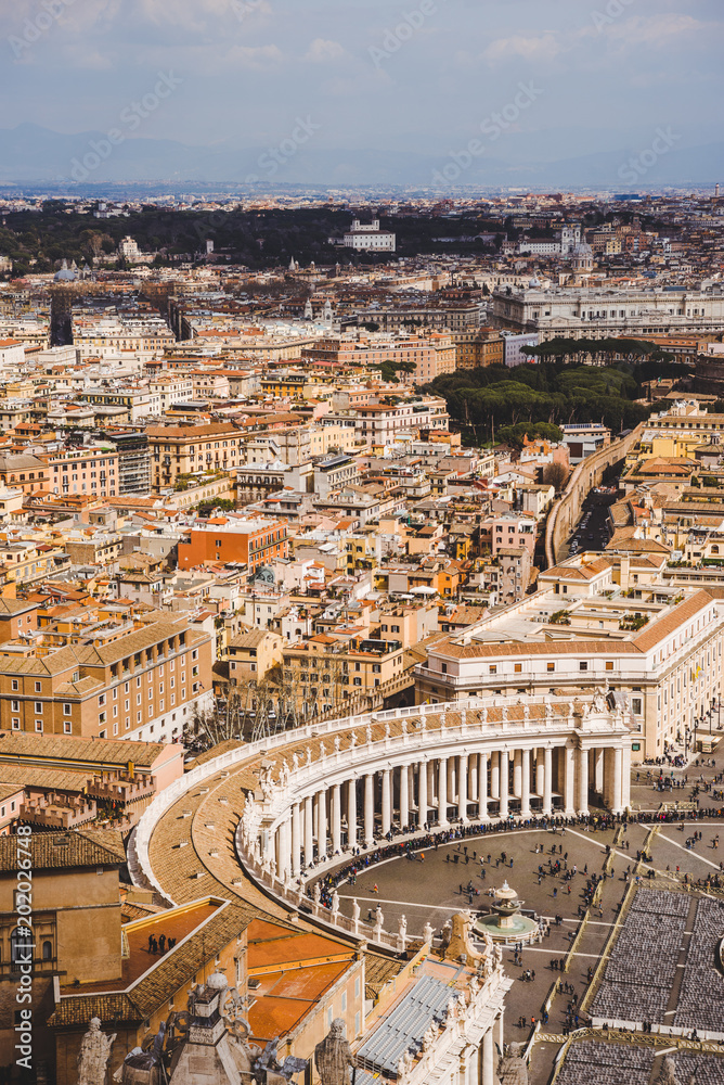 aerial view of St. Peter's square and ancient buildings of Vatican, Italy
