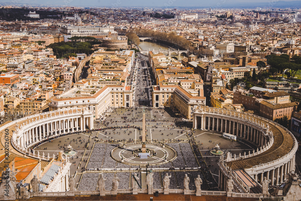 aerial view of St. Peter's square with Bernini colonnade, Vatican, Italy