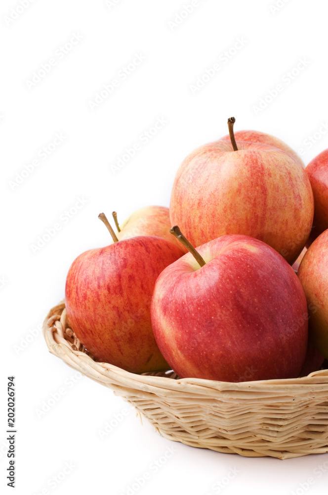 Apples in a basket on white background Apples in a basket on white background