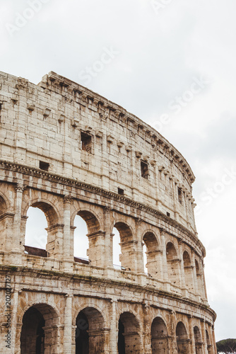 famous Colosseum ruins on cloudy day, Rome, Italy
