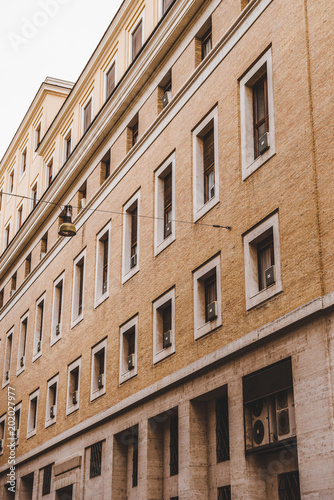 bottom view of grey building in Rome  Italy