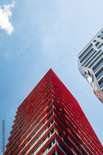 Looking up to contemporary skyscraper facade